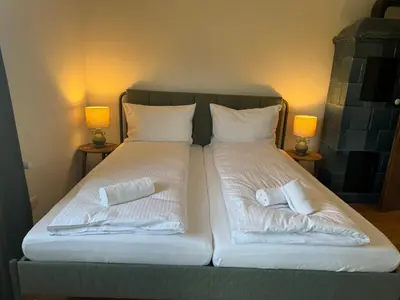 Ein Bett oder Betten in einem Zimmer der Unterkunft ღLIBORIA I Alpenblick Landhaus