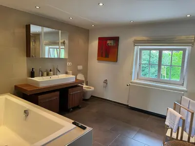 Ein Badezimmer in der Unterkunft ღLIBORIA I Alpenblick Landhaus