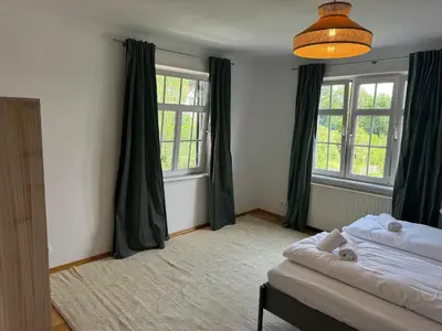 Ein Bett oder Betten in einem Zimmer der Unterkunft ღLIBORIA I Alpenblick Landhaus