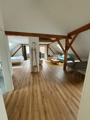 Ein Bett oder Betten in einem Zimmer der Unterkunft ღLIBORIA I Loft am Riegsee