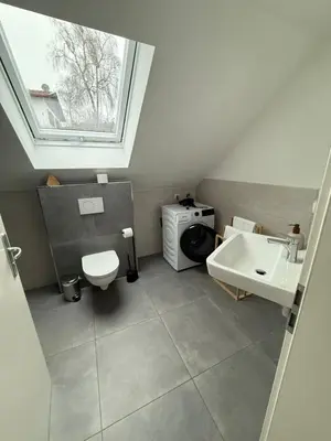 Ein Badezimmer in der Unterkunft ღLIBORIA I Loft am Riegsee