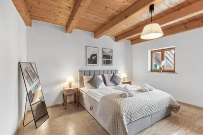 Ein Bett oder Betten in einem Zimmer der Unterkunft Casa Primavera - Stadtvilla mitten in Miesbach