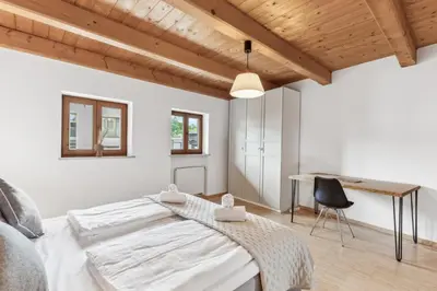 Ein Bett oder Betten in einem Zimmer der Unterkunft Casa Primavera - Stadtvilla mitten in Miesbach