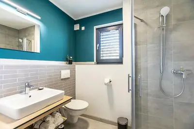 Ein Badezimmer in der Unterkunft Hotel MY BASE