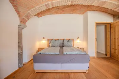 Ein Bett oder Betten in einem Zimmer der Unterkunft Gewölbe-Chalet am Schöberlhof