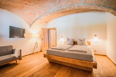Ein Bett oder Betten in einem Zimmer der Unterkunft Gewölbe-Chalet am Schöberlhof