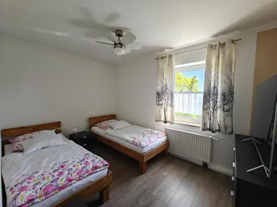 Ein Bett oder Betten in einem Zimmer der Unterkunft Apartment
