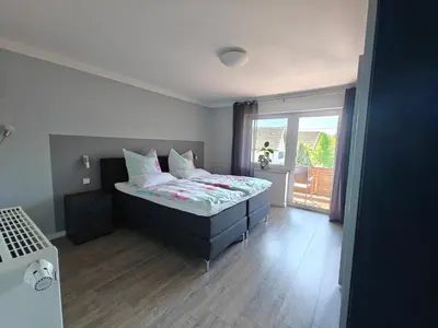 Ein Bett oder Betten in einem Zimmer der Unterkunft Apartment