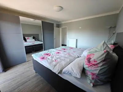 Ein Bett oder Betten in einem Zimmer der Unterkunft Apartment
