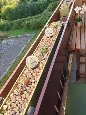 Ein Balkon oder eine Terrasse in der Unterkunft FeWo,zentral,ruhig und 30 Minuten nach München