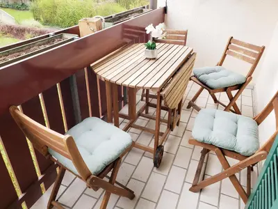 Ein Balkon oder eine Terrasse in der Unterkunft FeWo,zentral,ruhig und 30 Minuten nach München