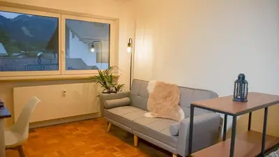 Ein Sitzbereich in der Unterkunft Ferienwohnung mit Bergblick & Netflix