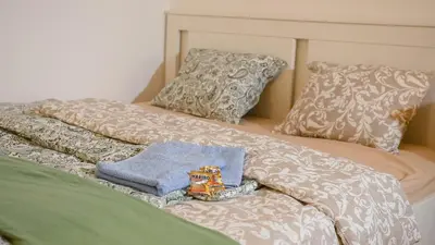 Ein Bett oder Betten in einem Zimmer der Unterkunft Ferienwohnung mit Bergblick & Netflix