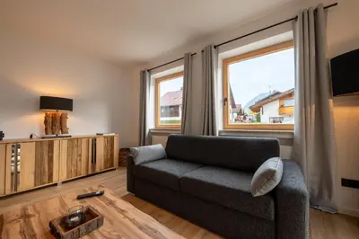 Ein Sitzbereich in der Unterkunft Lex'n Lodge