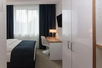 Ein Bett oder Betten in einem Zimmer der Unterkunft Bayer 89 Vi Vadi Hotel