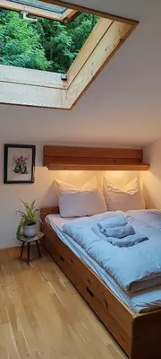 Ein Bett oder Betten in einem Zimmer der Unterkunft Ferienwohnung Spitzingsattel