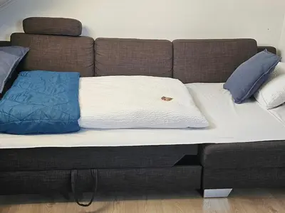 Ein Bett oder Betten in einem Zimmer der Unterkunft CASA8070 - Exklusive große Maisonette-Wohnung 91 qm für Familien, Gruppen, Geschäftsreisende, inklusive Parkplatz, WLAN, Kaffee und Tee, voll ausgestattet für 1 bis 9 Personen, zentrumsnah an der Autobahn A9 Ingolstadt-Süd