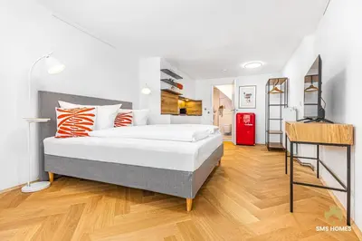 Ein Bett oder Betten in einem Zimmer der Unterkunft SMS-Homes I Auszeit im Zentrum