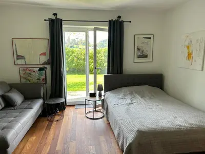 Ein Bett oder Betten in einem Zimmer der Unterkunft Ferienwohnung Aubach