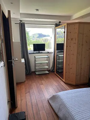 Ein Bett oder Betten in einem Zimmer der Unterkunft Ferienwohnung Aubach