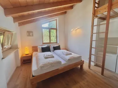 Ein Bett oder Betten in einem Zimmer der Unterkunft Ferienhaus 