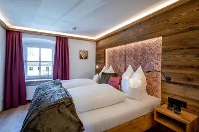 Ein Bett oder Betten in einem Zimmer der Unterkunft Moierhof - Der Ferienbauernhof am Chiemsee