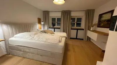 Ein Bett oder Betten in einem Zimmer der Unterkunft Laimgruber Hof - Naturresidenz