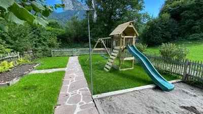 Ein Kinderspielbereich in der Unterkunft Laimgruber Hof - Naturresidenz
