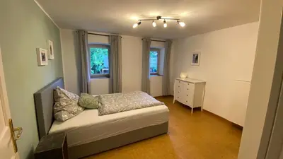 Ein Bett oder Betten in einem Zimmer der Unterkunft Laimgruber Hof - Naturresidenz