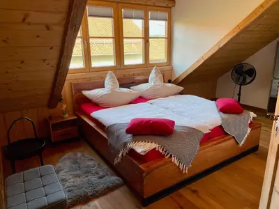 Ein Bett oder Betten in einem Zimmer der Unterkunft Feriendomizil Hafner