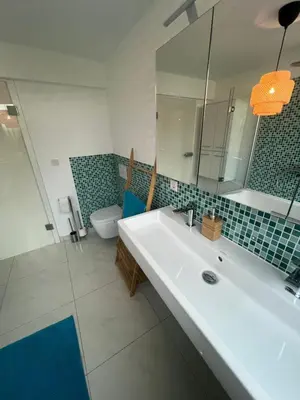 Ein Badezimmer in der Unterkunft Zimmer im Haus nahe Ubahn