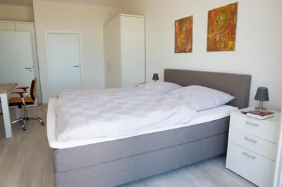 Ein Bett oder Betten in einem Zimmer der Unterkunft Terrasse im Ammergau