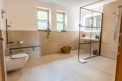 Ein Badezimmer in der Unterkunft Graf Chiemo Suites - direkt am Chiemsee mit separatem Seezugang