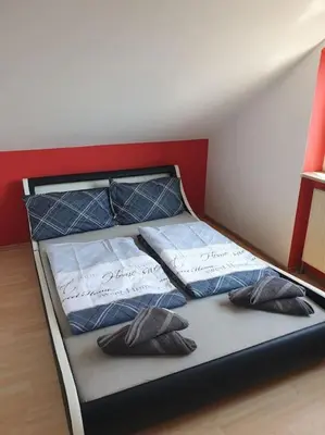 Ein Bett oder Betten in einem Zimmer der Unterkunft Schöne Wohnung zentral Ingolstadt