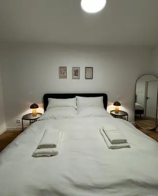 Ein Bett oder Betten in einem Zimmer der Unterkunft Chiemgau One