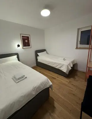 Ein Bett oder Betten in einem Zimmer der Unterkunft Chiemgau One