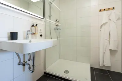Ein Badezimmer in der Unterkunft CASA Sunset Augsburg - unvergessliche Aussicht - 1min zu TRAM&Bus
