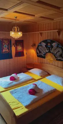 Ein Bett oder Betten in einem Zimmer der Unterkunft Seminarhaus Arya Maitreya