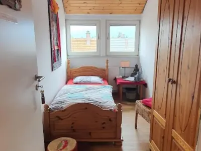 Ein Bett oder Betten in einem Zimmer der Unterkunft Seminarhaus Arya Maitreya
