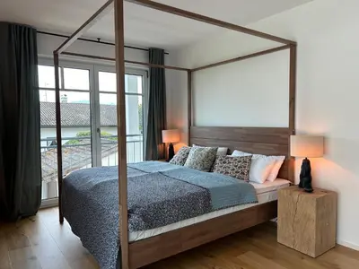 Ein Bett oder Betten in einem Zimmer der Unterkunft Ferienwohnung Mühlbach
