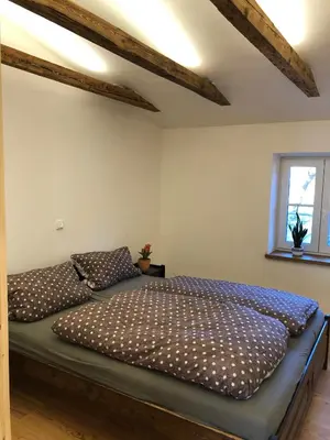 Ein Bett oder Betten in einem Zimmer der Unterkunft Ferienwohnung Welschenkramer