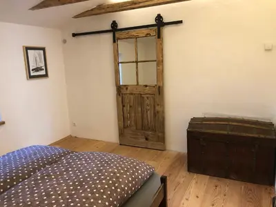 Ein Bett oder Betten in einem Zimmer der Unterkunft Ferienwohnung Welschenkramer