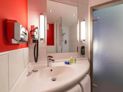 Ein Badezimmer in der Unterkunft Ibis Muenchen City Ost