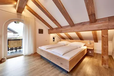 Ein Bett oder Betten in einem Zimmer der Unterkunft Ferienwohnung Wittmann