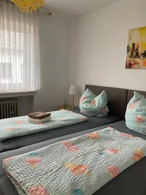 Ein Bett oder Betten in einem Zimmer der Unterkunft FeWo Anne