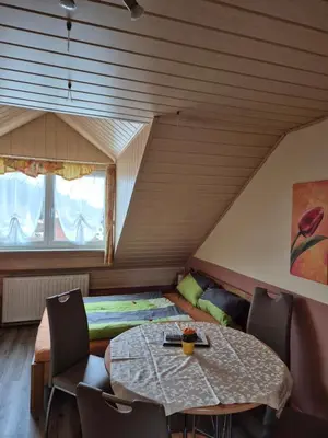 Ein Sitzbereich in der Unterkunft Pension Wolkenstein