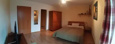 Ein Bett oder Betten in einem Zimmer der Unterkunft Bergblick