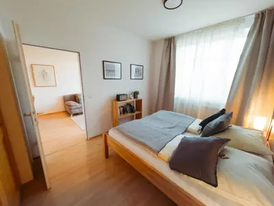 Ein Bett oder Betten in einem Zimmer der Unterkunft Ferienwohnung Ammersee