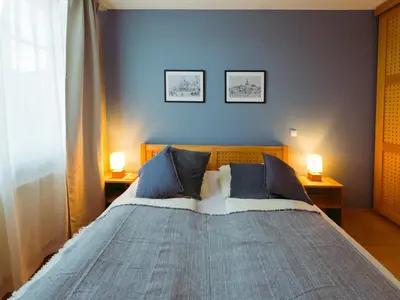 Ein Bett oder Betten in einem Zimmer der Unterkunft Ferienwohnung Ammersee