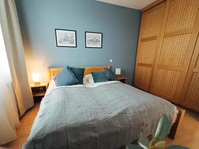 Ein Bett oder Betten in einem Zimmer der Unterkunft Ferienwohnung Ammersee